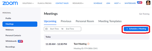 blue button labeled schedule a meeting under the meetings tab in zoom